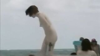 Sexy naked people in a beach voyeur video