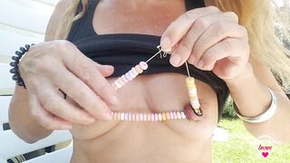 Nippleringlover Inserting Chain with Candies through Large Gauge Nipple Piercings with Nipple Tunnel