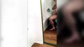 Fucking her pussy in the bathroom