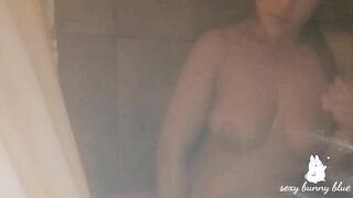 Milf masturbates in the shower