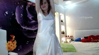 Beautiful redhead dance tease in Satin white dress with transparent panties