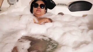 Busty Latina mischief in the hot tub