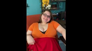 Chubby busty Velma plays with huge tits and shows panties.