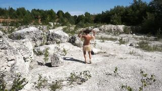 Topless Barbarian Dance on boulder (skinny MILF)