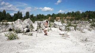 Topless Barbarian Dance on boulder (skinny MILF)