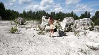 Topless Barbarian Dance on boulder (skinny MILF)