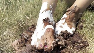 Smashing a cake with my feet. The chocolate and cream gateaux feels so nice between my toes