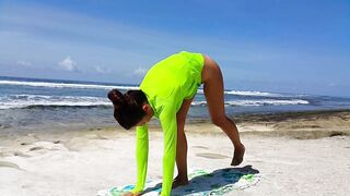 Naked YOGA # Morning Yoga exercises at Ocean Shore