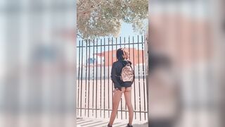 college girl shows her breasts and buttocks in a public area and they catch her