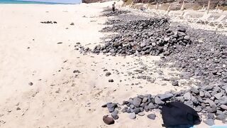 sunbathing without a swimsuit on a public beach