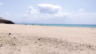 sunbathing without a swimsuit on a public beach