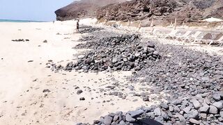 sunbathing without a swimsuit on a public beach