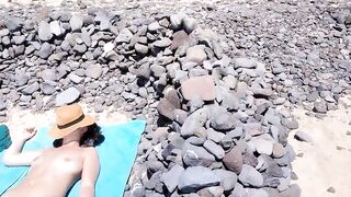 sunbathing without a swimsuit on a public beach