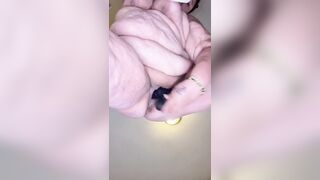 BBW squirts all over on phone standing view