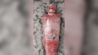 NANA Mummified with red plastic tape and then played with for orgasms