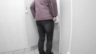 Pissing in a public toilet mature milf.