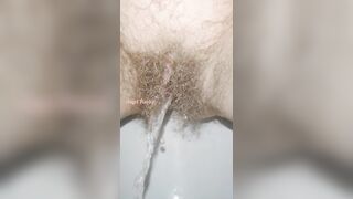 Sensual Slow Motion Piss by Mega Hairy Pussy Up Close