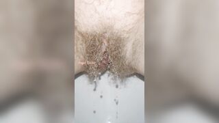 Sensual Slow Motion Piss by Mega Hairy Pussy Up Close