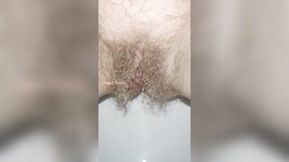 Sensual Slow Motion Piss by Mega Hairy Pussy Up Close