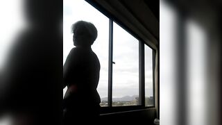 Las Vegas Slut Teases at Window