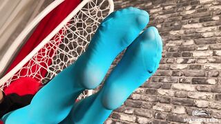 Mistress foot teasing you in hanging chair in white dirty socks and blue tights